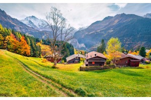 Фототапет планински пейзаж Алпи с фермерски къщи 