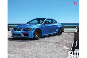 Фототапети син автомобил bmw с морски пейзаж